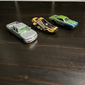 Hot Wheels Bundle Of 3 Diecast Cars Nissan Titan Hover & Out Dodge Demon